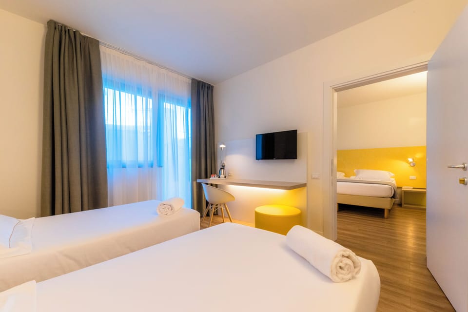 Two connecting double rooms | Minibar, in-room safe, desk, soundproofing