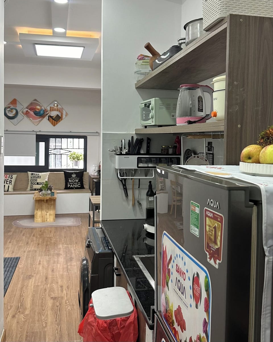 Deluxe Room, 1 King Bed | Private kitchen | Full-size fridge, microwave