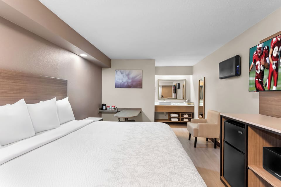 Desk, blackout drapes, soundproofing, iron/ironing board