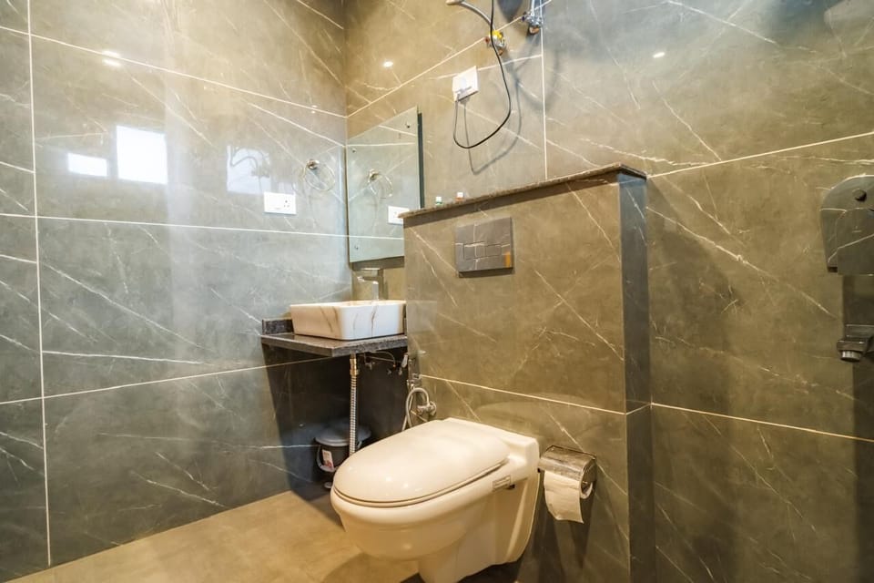 Shower, free toiletries, slippers, towels