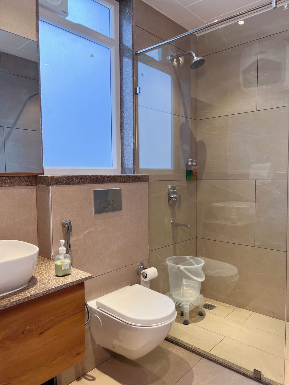 Shower, slippers, towels, soap