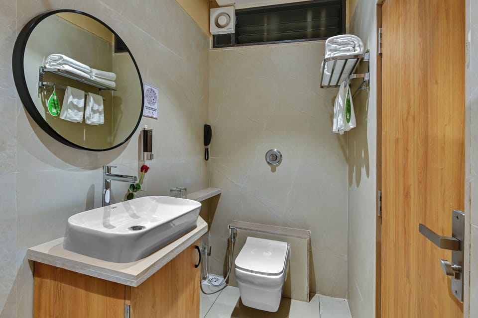 Shower, slippers, towels, soap