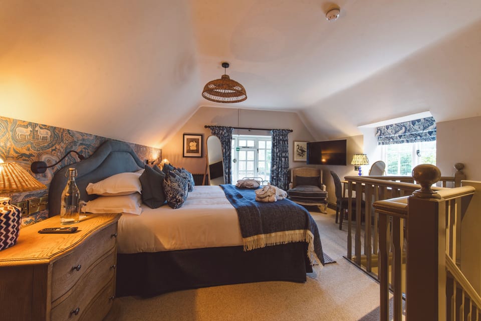 Whooper Cottage with Hot Tub | Premium bedding, in-room safe, individually decorated
