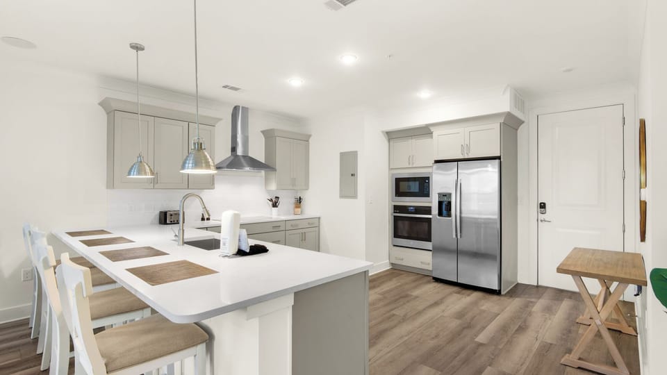 Condo, Multiple Beds, Balcony, Garden View (Pinewood30A 436 - No Pets Allowed) | Private kitchen | Fridge, microwave, oven, stovetop