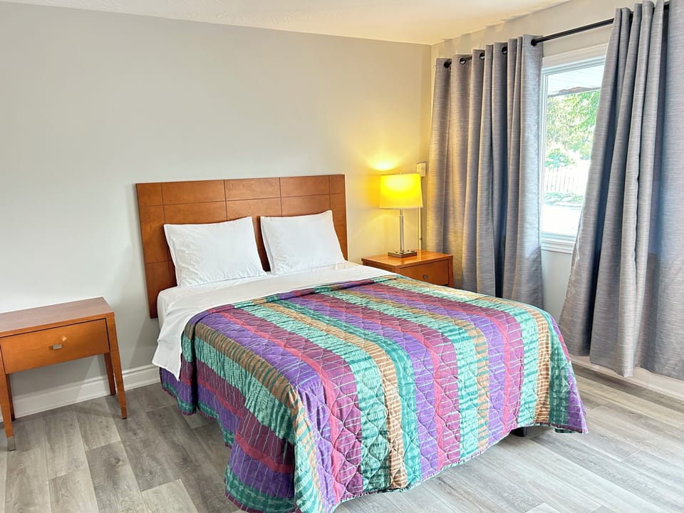 Deluxe Single Room, Garden View | Desk, laptop workspace, free WiFi