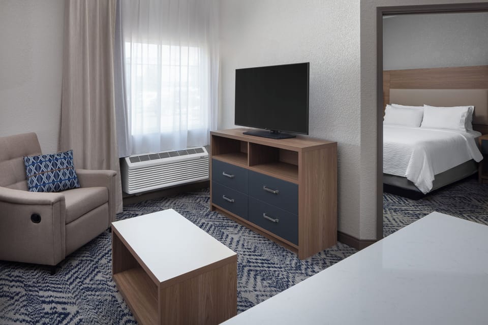 Suite, 1 Bedroom | Desk, blackout drapes, iron/ironing board, WiFi (free)