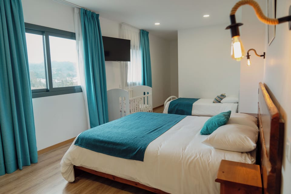 Family Quadruple Room, Multiple Beds, Private Bathroom | Memory foam beds, individually decorated, individually furnished