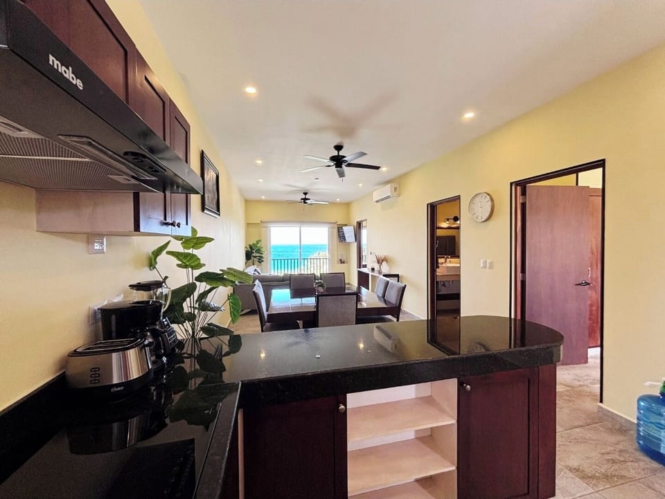 Apartment, Patio, Sea View | Private kitchen | Fridge, microwave, cookware/dishes/utensils