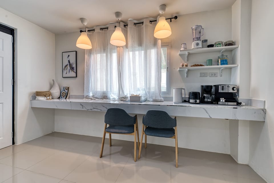 House, Garden View | Private kitchen | Espresso maker, coffee/tea maker, full-size fridge, microwave