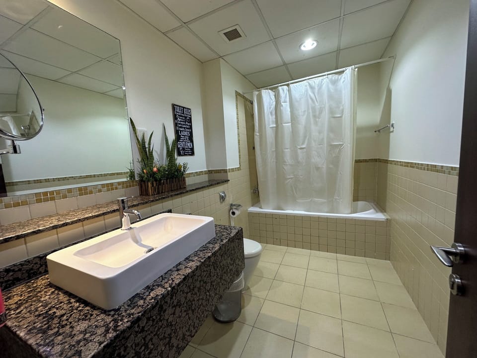 Comfort Shared Dormitory, City View | Bathroom | Separate tub and shower, hair dryer, towels, soap
