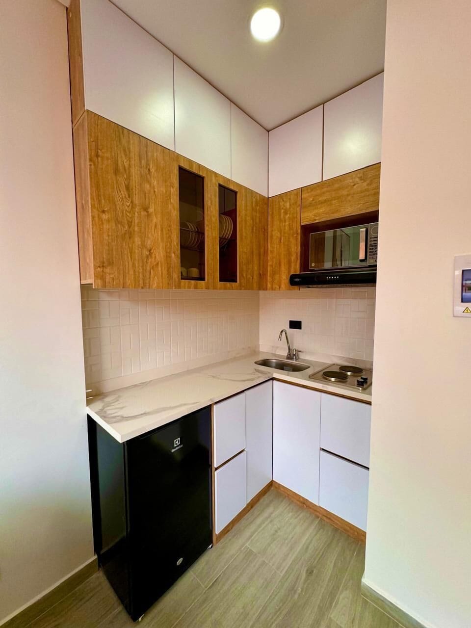 Standard Apartment, Balcony, City View | Private kitchen | Coffee/tea maker