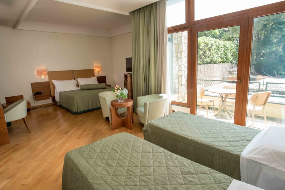 Triple Room | Premium bedding, down comforters, Select Comfort beds, minibar
