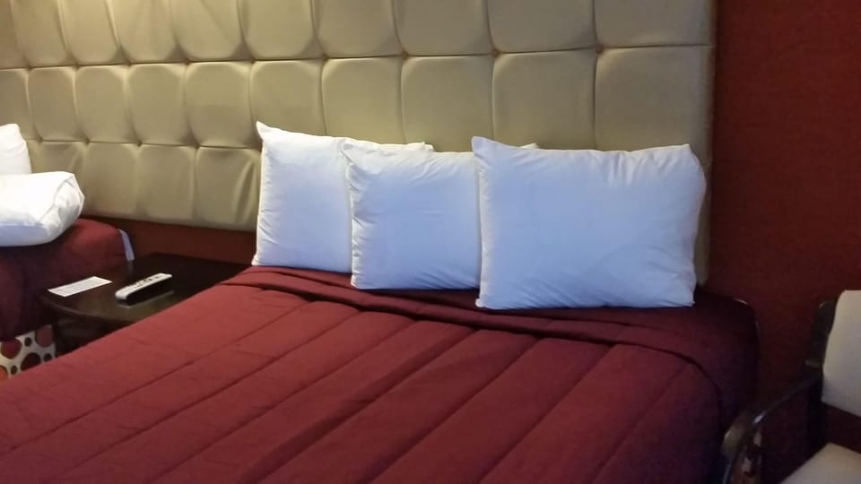 Standard Room, 2 Queen Beds | Blackout drapes, free WiFi, bed sheets