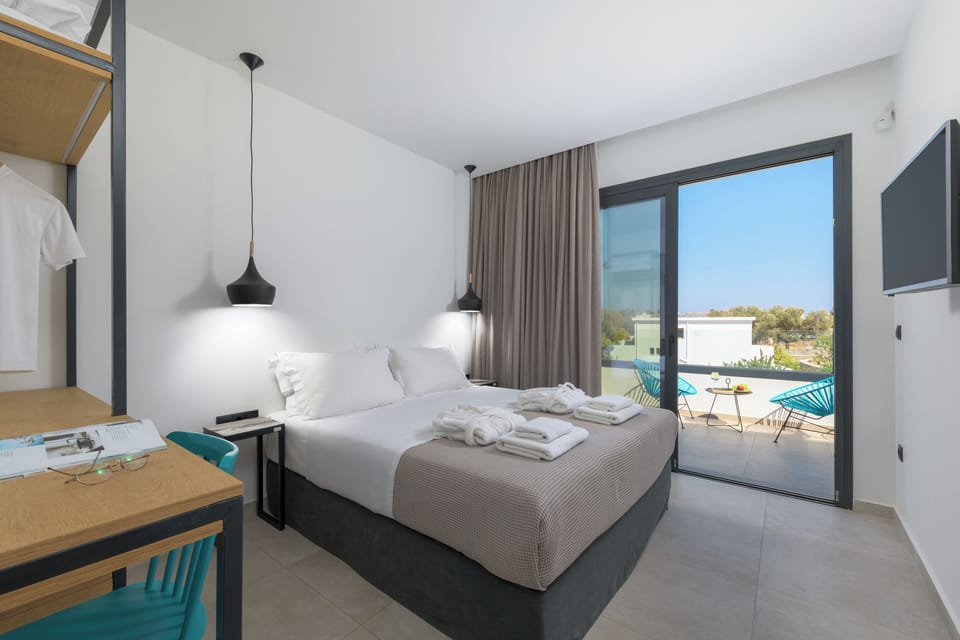 2 bedrooms, blackout drapes, soundproofing, iron/ironing board