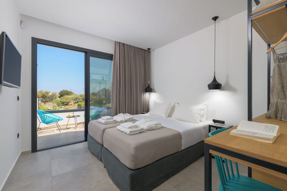 2 bedrooms, blackout drapes, soundproofing, iron/ironing board