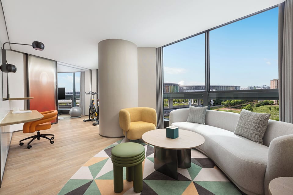 Suite, 1 Bedroom, Garden View | Down comforters, in-room safe, blackout drapes, soundproofing