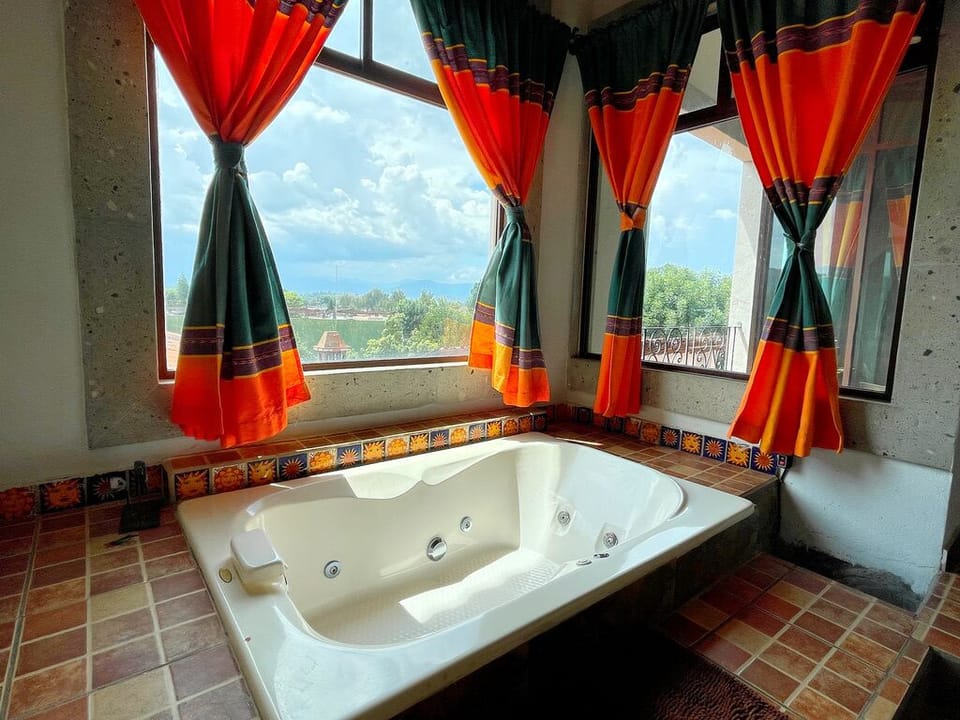 Junior Suite, Partial Lake View | Bathroom | Towels, soap, shampoo, toilet paper
