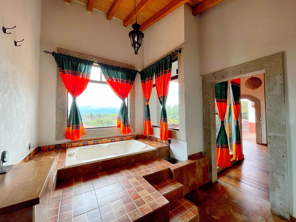 Junior Suite, Partial Lake View | Bathroom | Towels, soap, shampoo, toilet paper