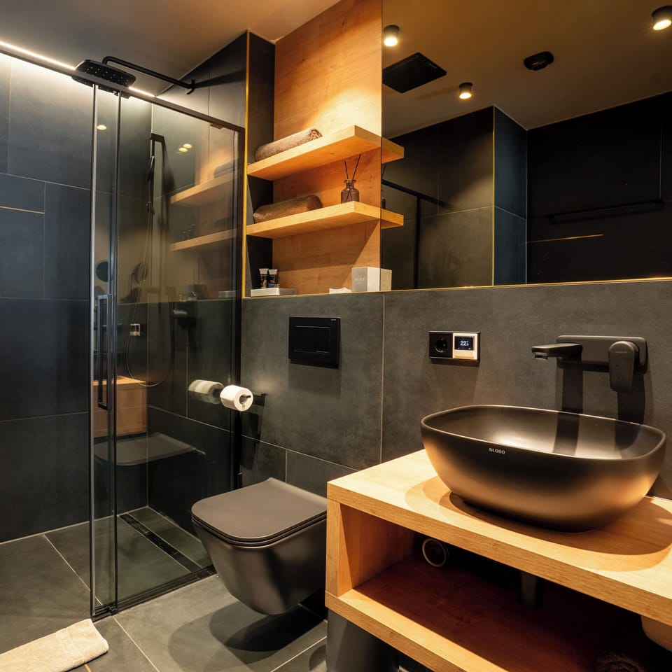 Shower, designer toiletries, hair dryer, heated floors