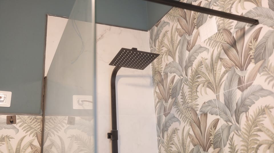 Luxury Suite, Balcony, City View | Bathroom | Shower, hair dryer, bidet, towels