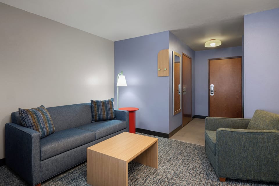 Suite, Multiple Beds | In-room safe, desk, iron/ironing board, free cribs/infant beds