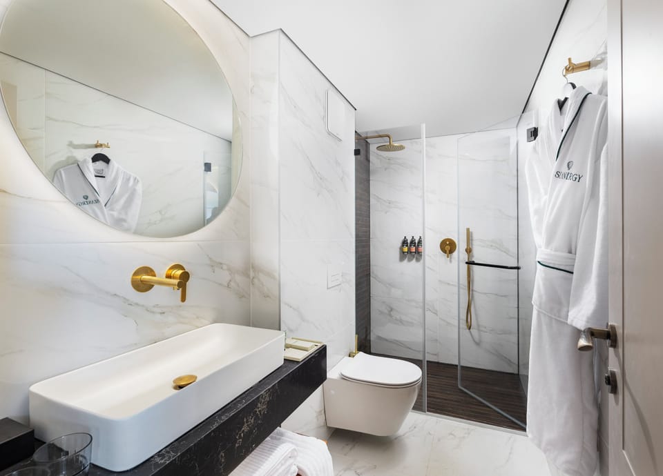 Shower, hair dryer, bathrobes, slippers