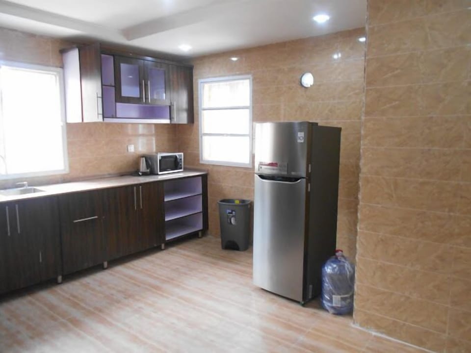 Deluxe Room, Balcony, City View | Private kitchen | Fridge, microwave, oven, stovetop