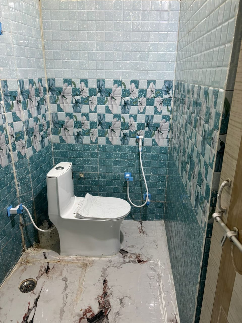 Shower, slippers, bidet, towels