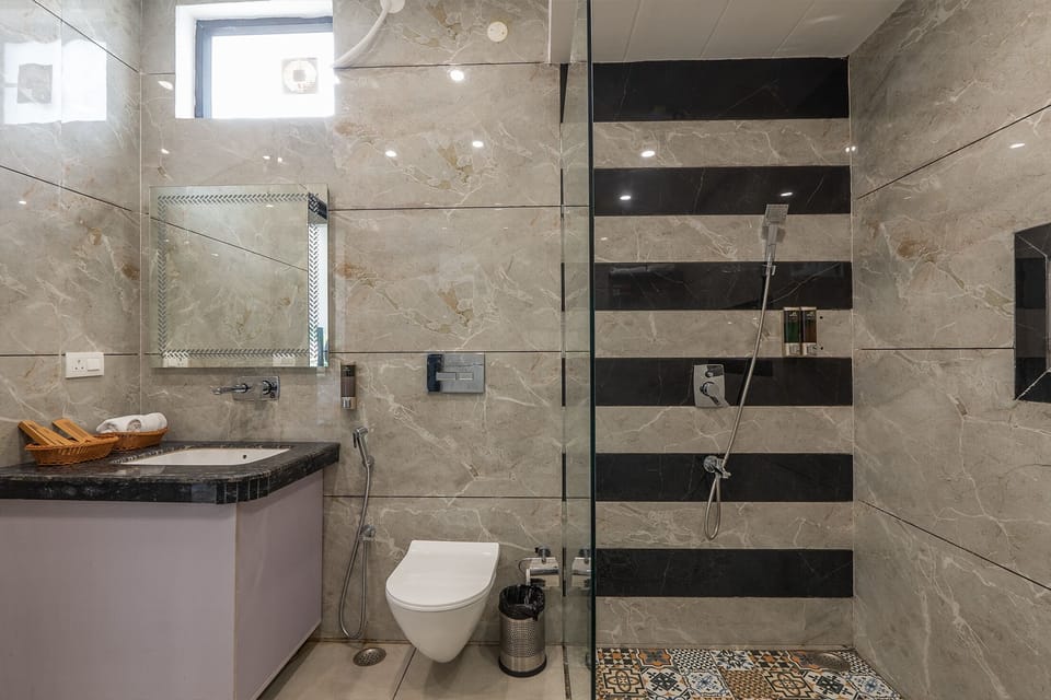 Orchid | Bathroom | Shower, free toiletries, hair dryer, bathrobes