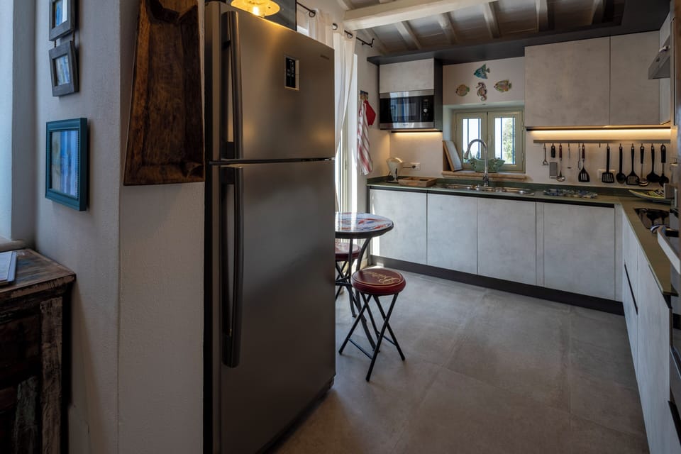Villa, Garden View | Private kitchen | Full-size fridge, microwave, oven, dishwasher