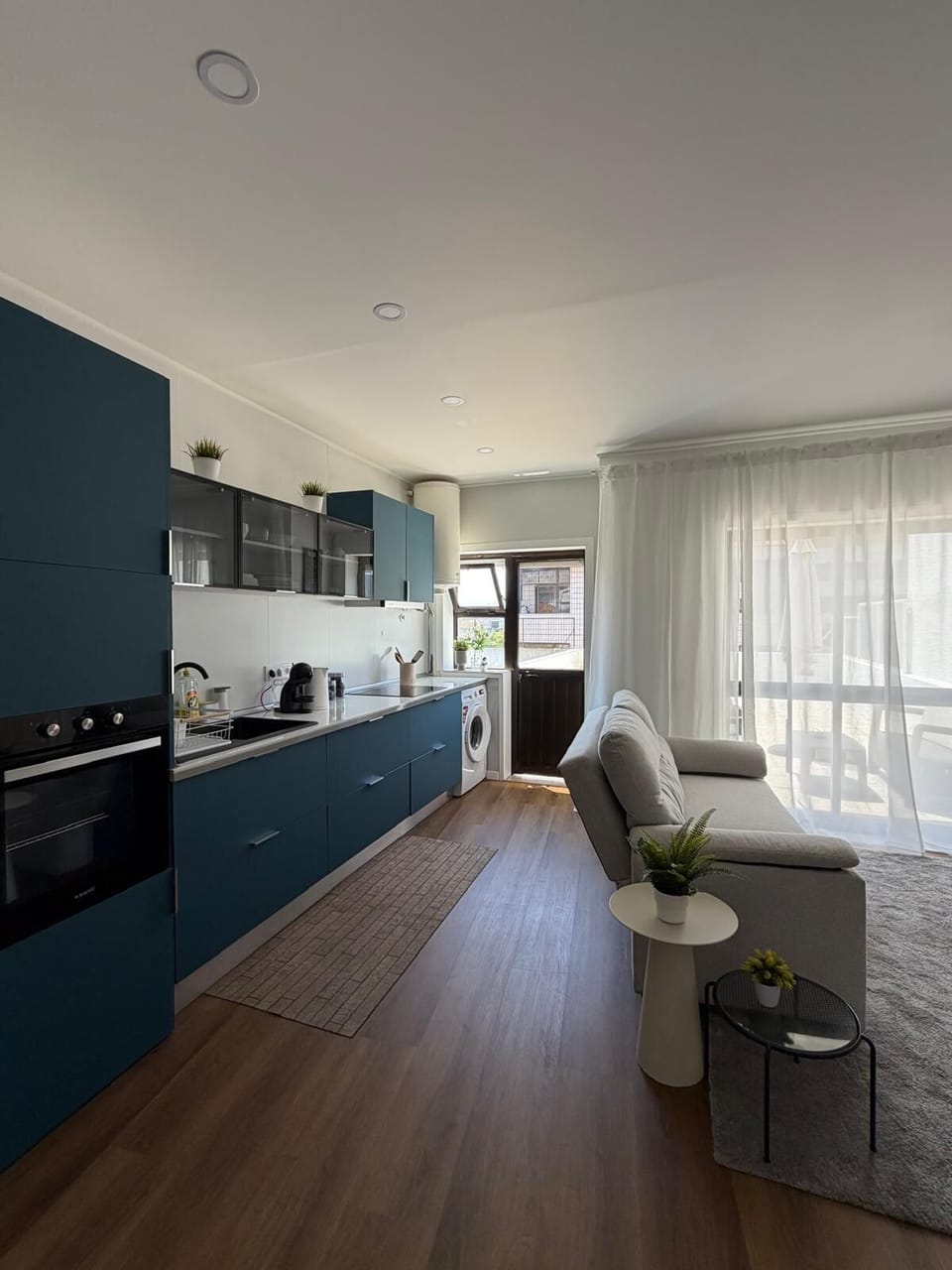 City Apartment, City View | Living area | Flat-screen TV