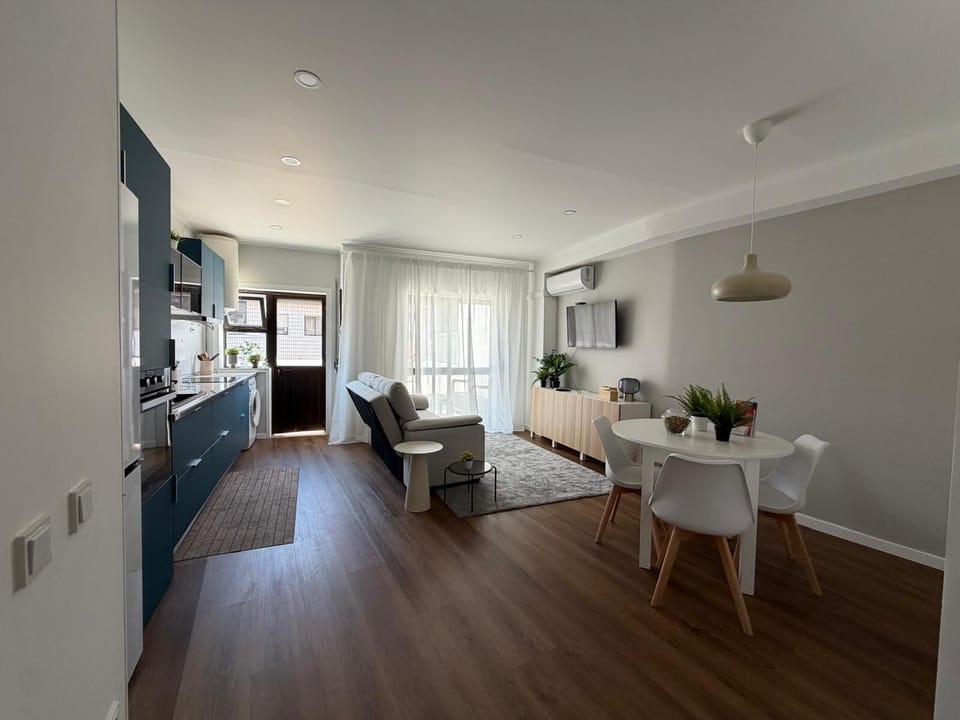 City Apartment, City View | Living area | Flat-screen TV