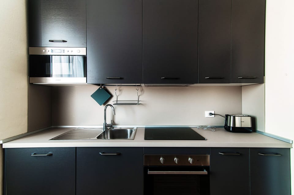 Apartment | Private kitchen | Full-size fridge, microwave, oven, stovetop