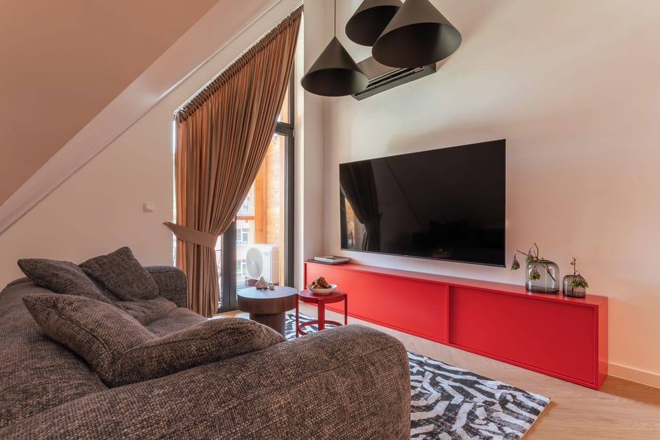 Superior Apartment | Living area | Flat-screen TV