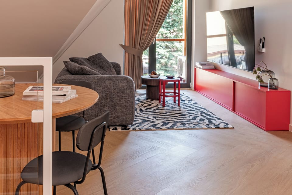 Superior Apartment | Living area | Flat-screen TV