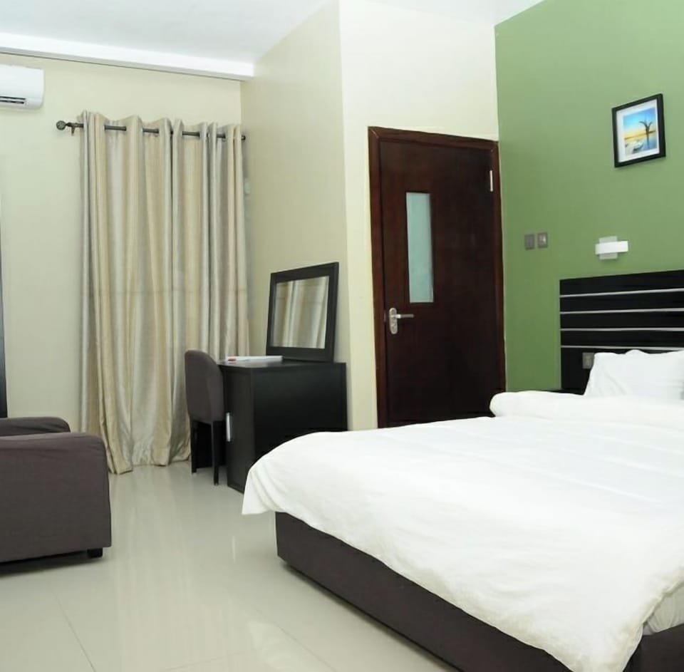 Deluxe Room, Balcony, City View | Desk, laptop workspace, free WiFi