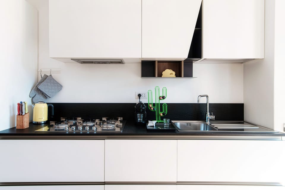 Condo, Balcony | Private kitchen | Full-size fridge, microwave, oven, stovetop