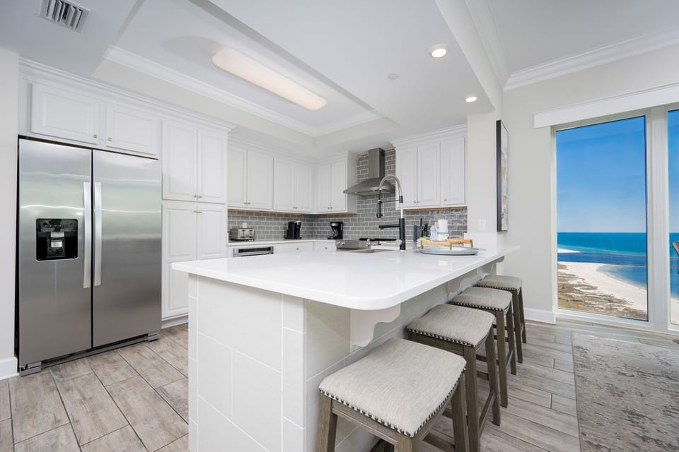 Condo, 4 Bedrooms | Private kitchen | Coffee/tea maker, fridge, oven