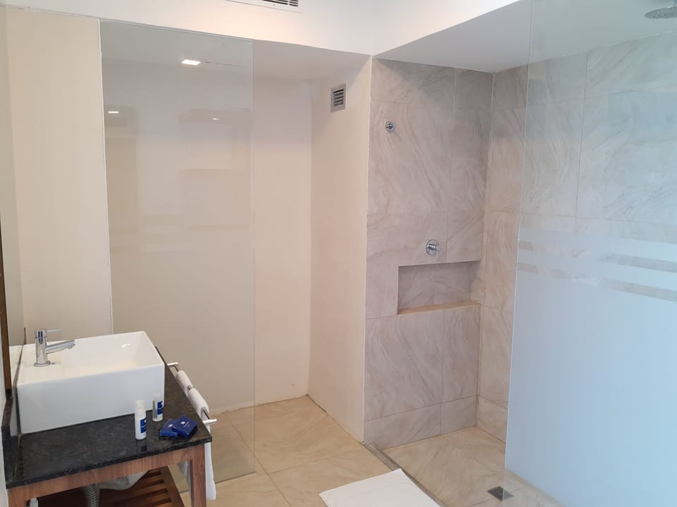 Premium Double Room, Balcony, Sea View | Bathroom | Shower, hair dryer, towels, soap