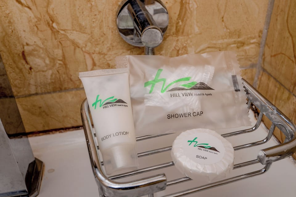 Shower, free toiletries, hair dryer, slippers