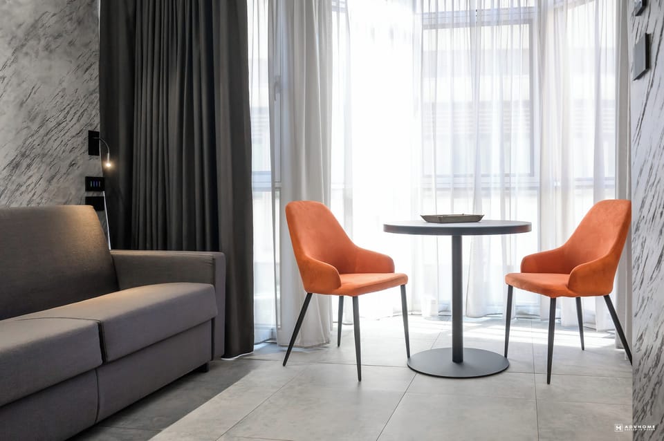 Deluxe Quadruple Room | Premium bedding, down comforters, memory foam beds, free minibar