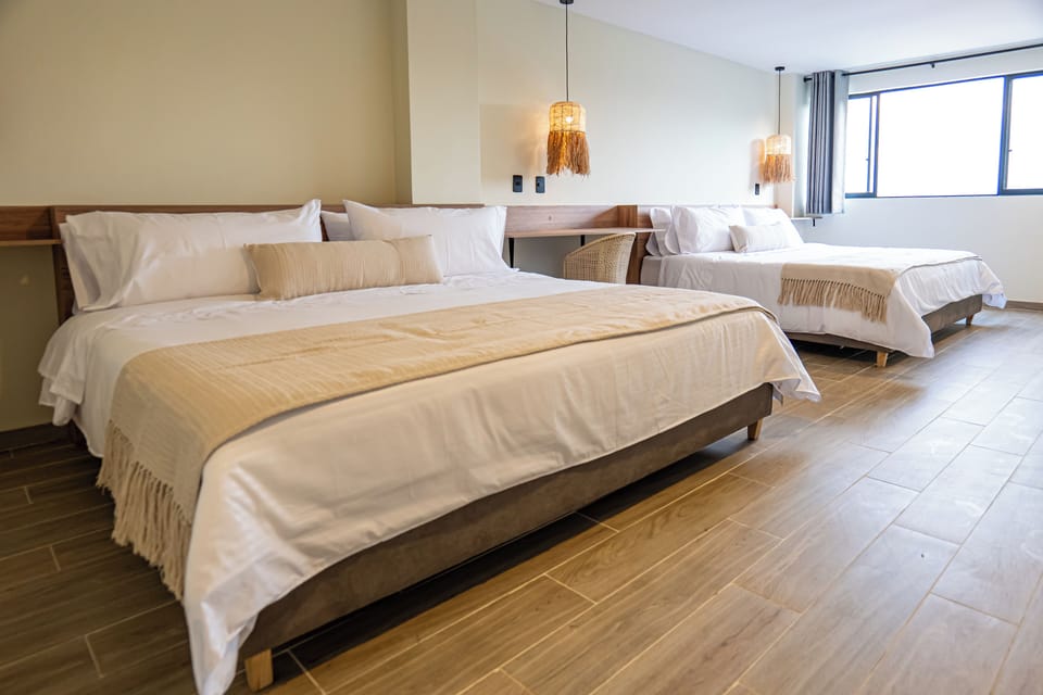 Standard Quadruple Room, Mountain View | In-room safe, free WiFi