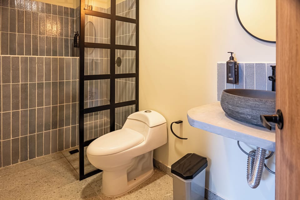 Basic Double Room | Bathroom | Shower, hair dryer, towels, soap
