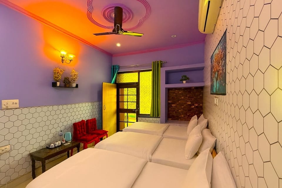 Family Triple Room, Balcony | Desk, laptop workspace, free WiFi