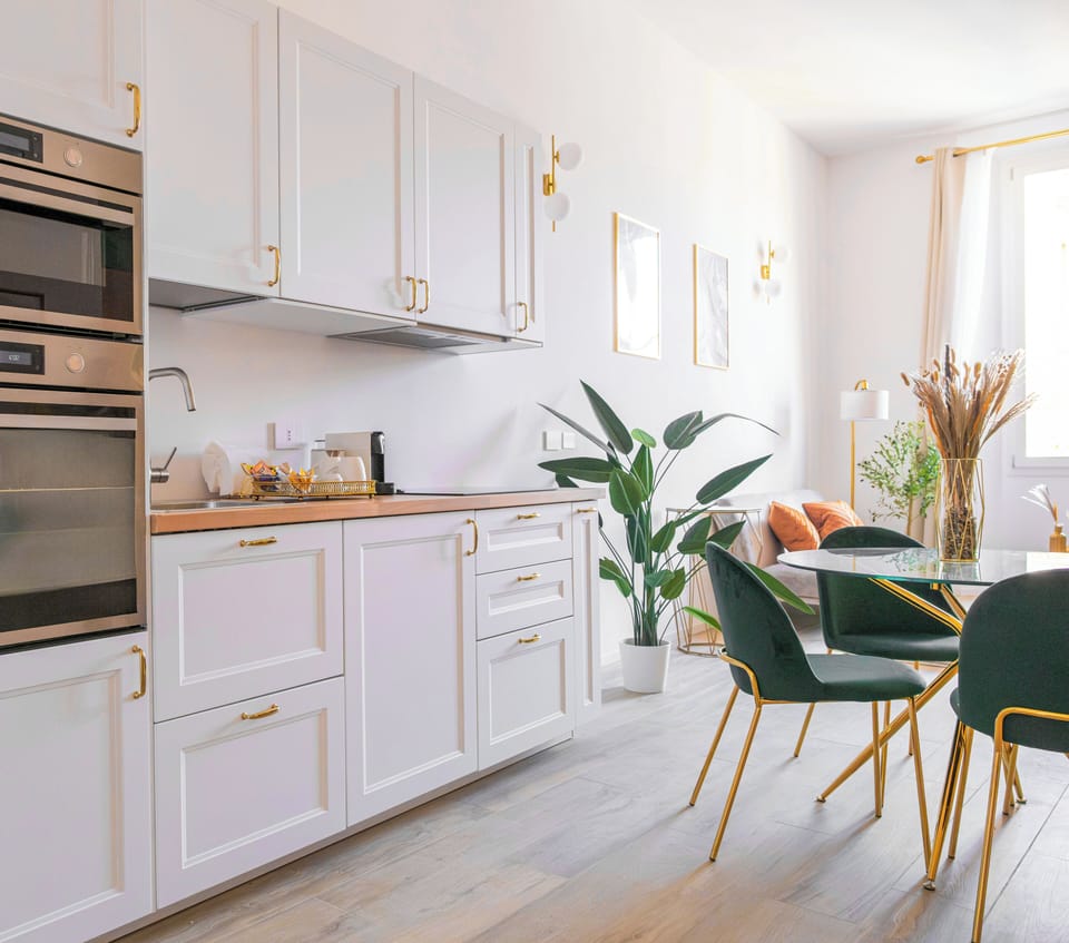 Luxury Studio Suite, City View | Private kitchen | Full-size fridge, microwave, oven, stovetop