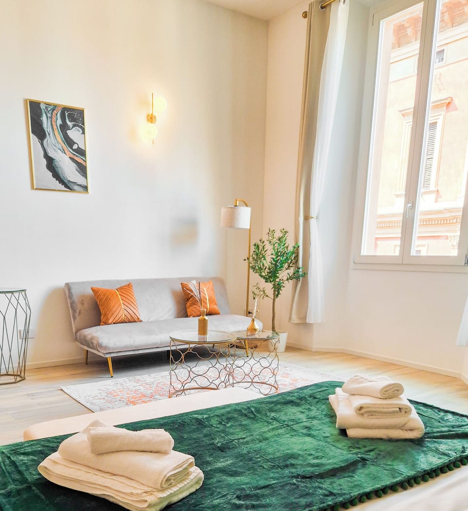 Luxury Studio Suite, City View | Living area | 55-inch Smart TV with cable channels