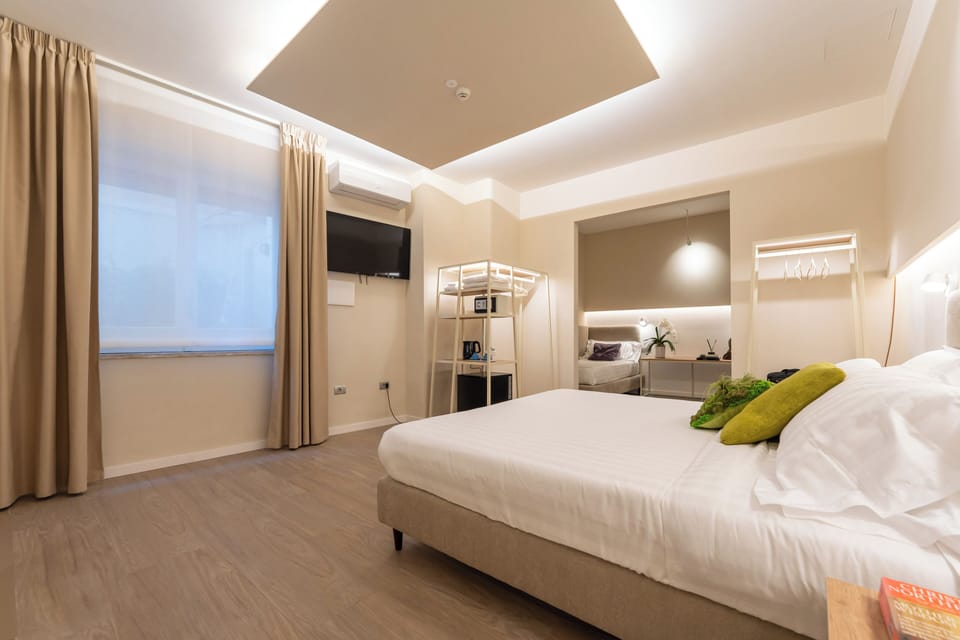Family Quadruple Room | Egyptian cotton sheets, premium bedding, in-room safe, desk