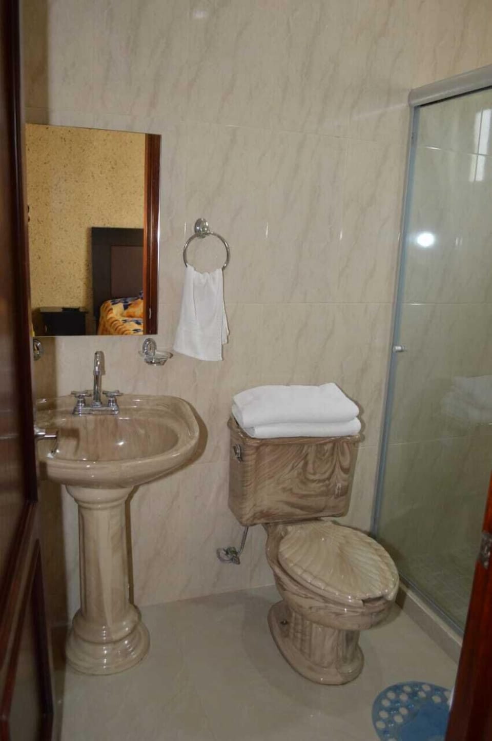 Shower, towels, soap, shampoo