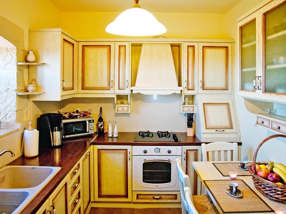 Villa | Private kitchen | Fridge, microwave, oven, coffee/tea maker