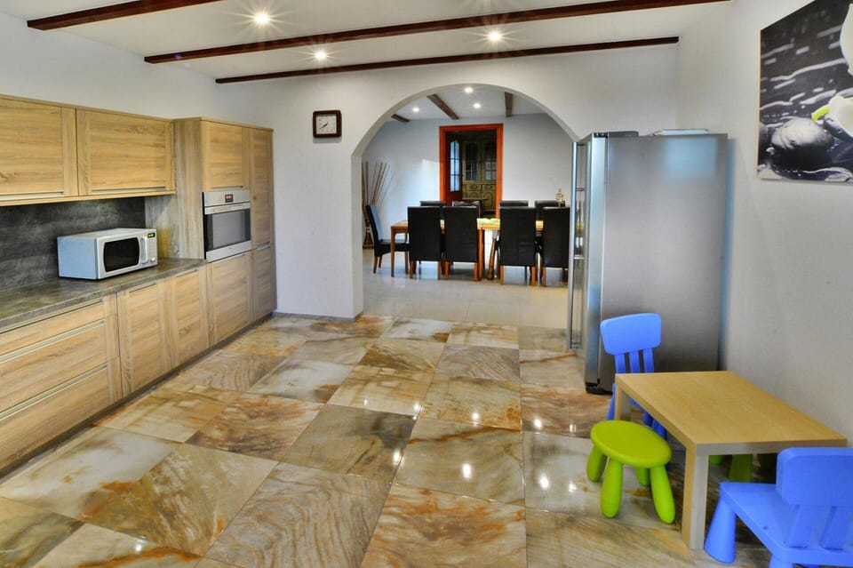 Villa | Private kitchen | Electric kettle, toaster, highchair